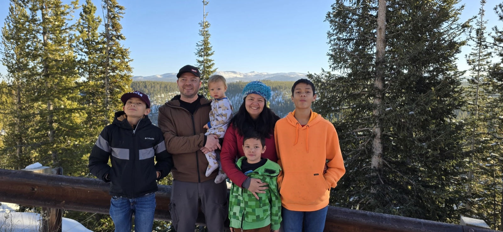 Arcel with her family in the mountains
